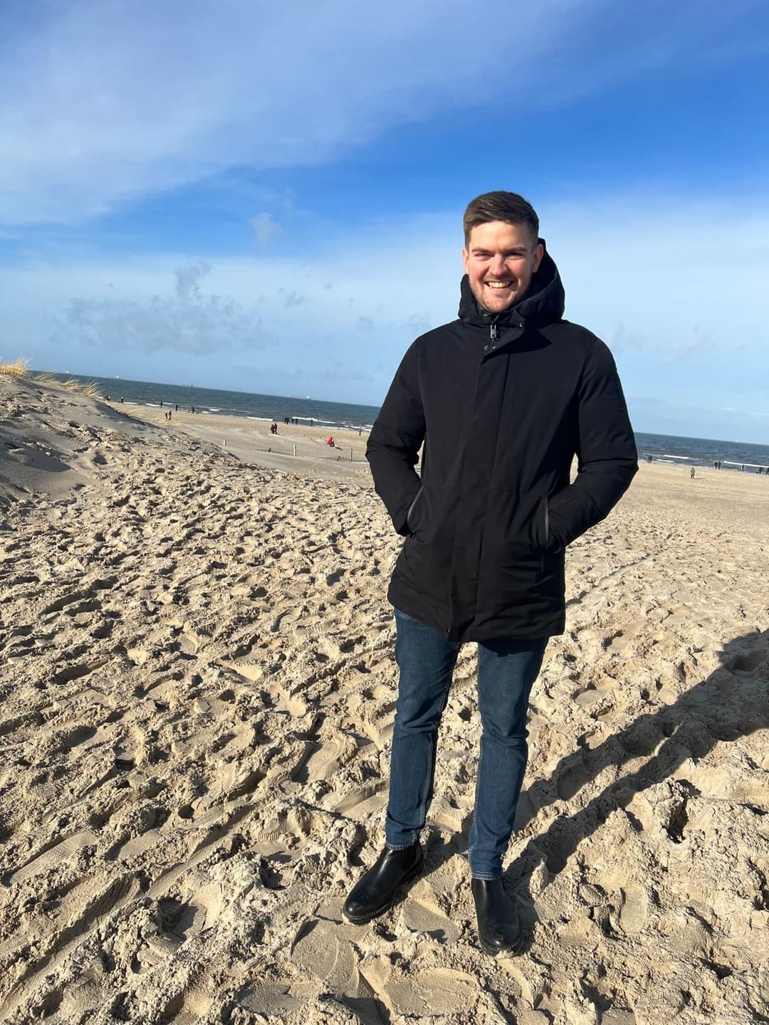 Kunde am Strand